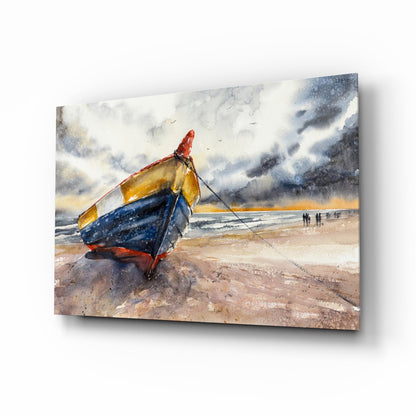 Colorful fishing boat with red, yellow, and blue hull beached on sand under stormy sky, displayed as glass wall art.