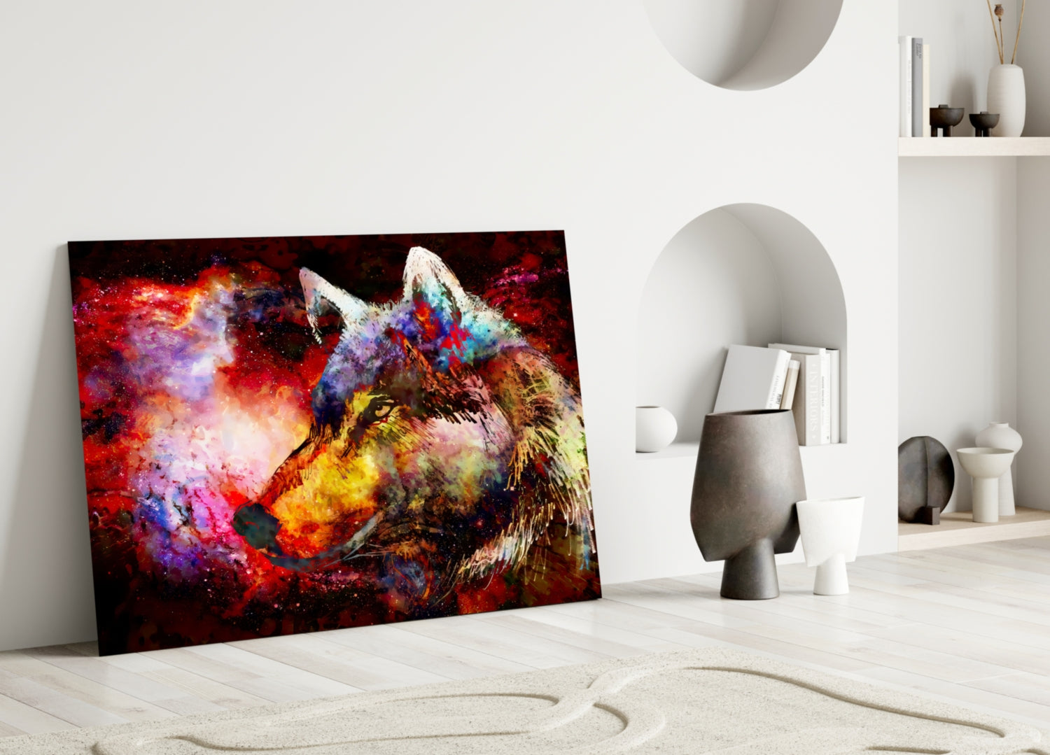 Colorful wolf glass wall art leaning against white wall in minimalist interior with decorative objects and shelving.