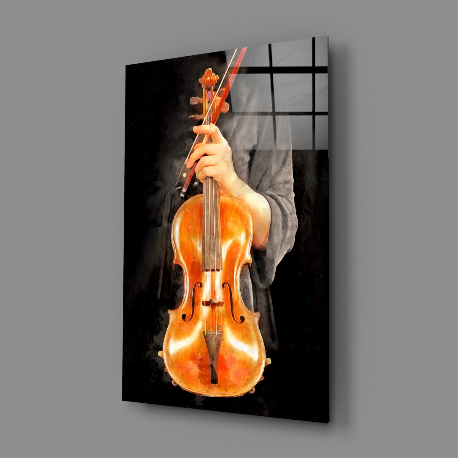 Musician in dark clothing holds a glowing amber violin with bow against black background on glass wall art.