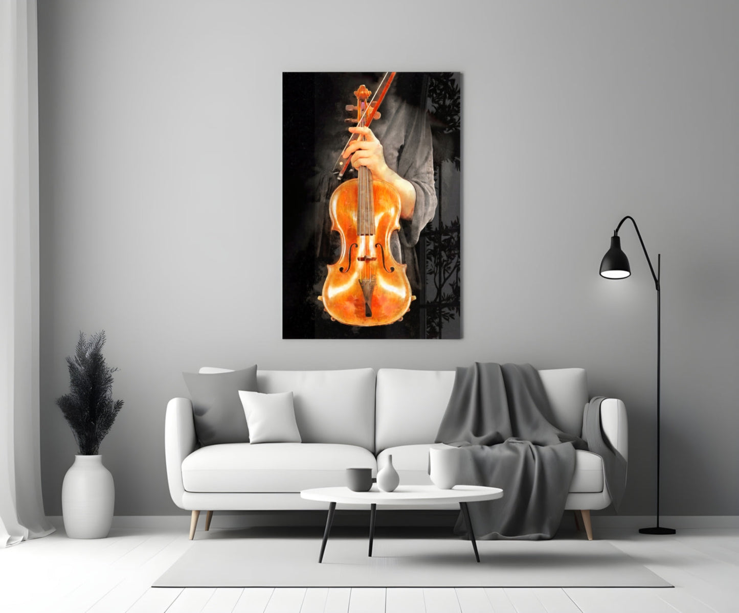 Violin glass wall art displaying a golden-brown violin held by hands against a black background, mounted above a white sofa in a modern living room setting.