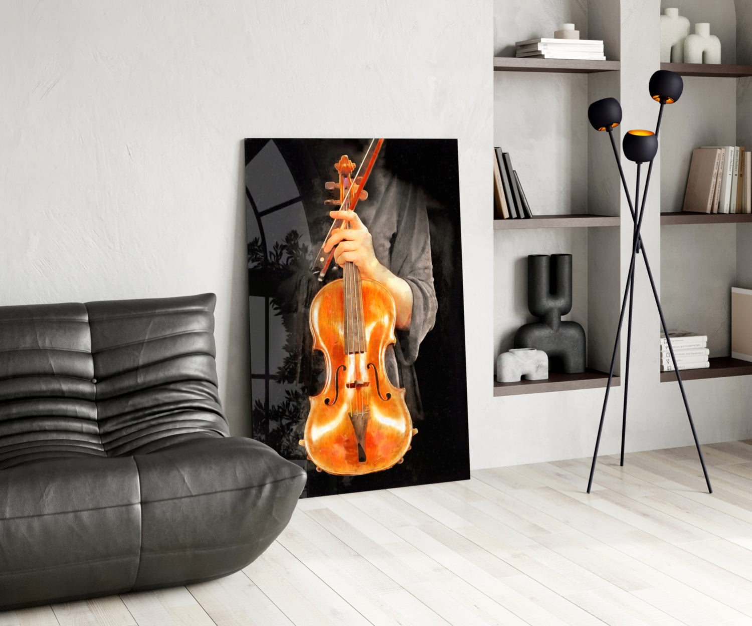 Modern living room interior featuring a leaning glass wall art depicting a glowing amber violin held by hands against black background.