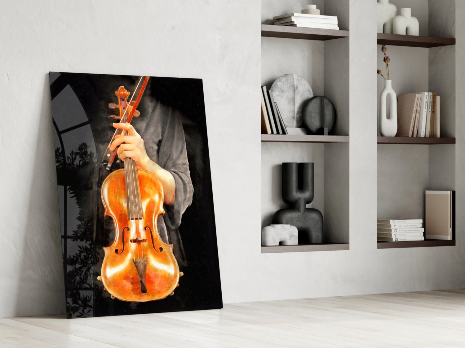 Violin glass wall art leaning against white wall displaying glowing orange violin held by hands on black background.