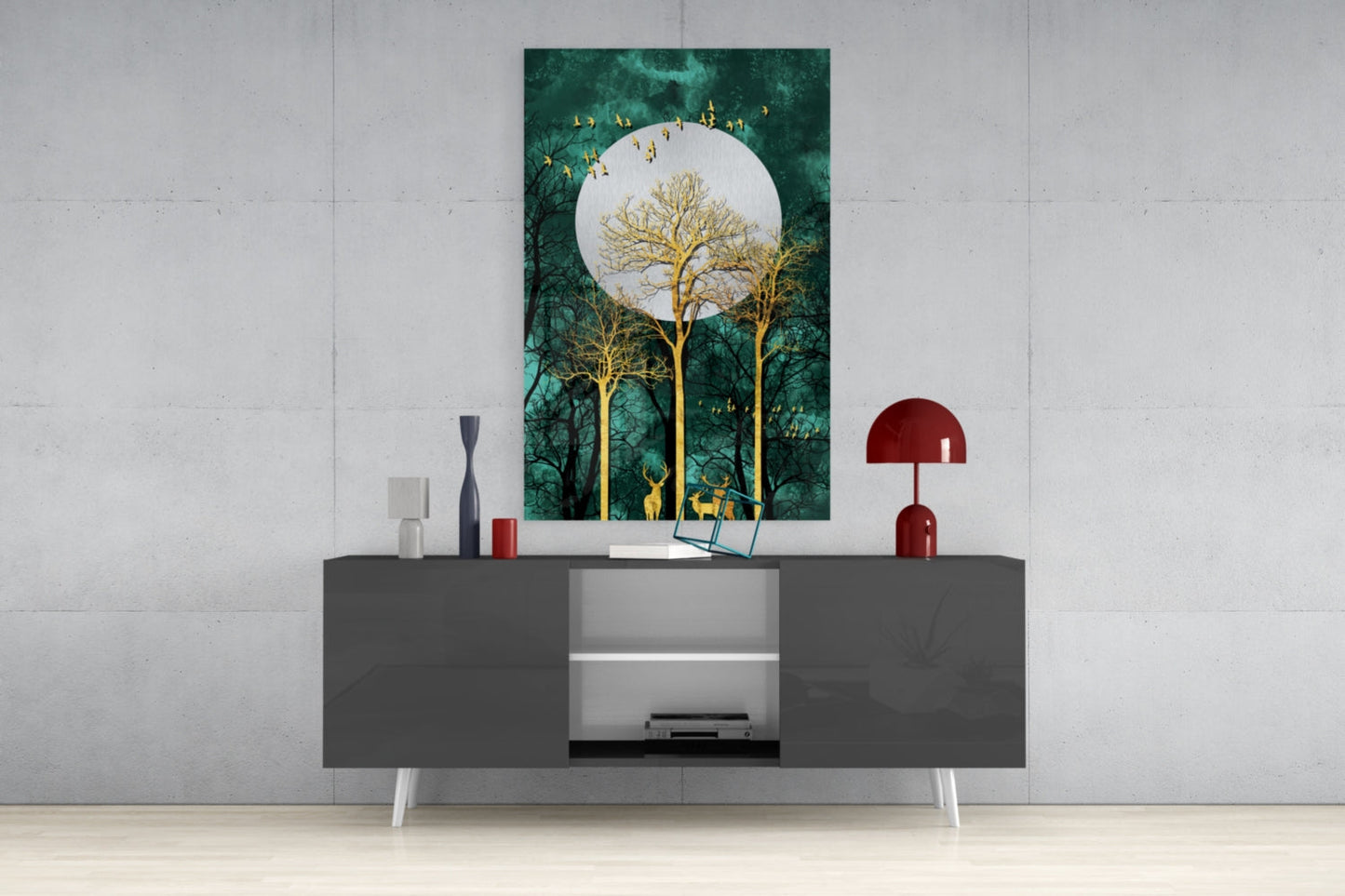 Modern living room display featuring Night Glass Wall Art with golden trees and white moon on teal background hung above gray media console.