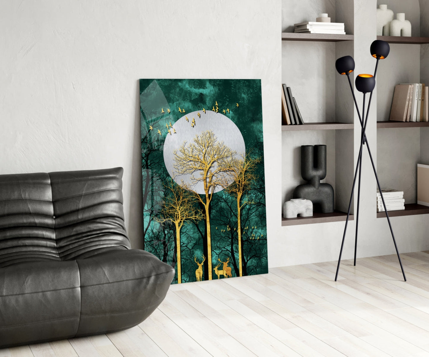 Night Glass Wall Art displayed in modern living room beside gray leather chair, featuring golden trees and white moon on teal background.