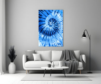 Blue mosaic glass wall art with radial tie-dye pattern displayed above white sofa in modern living room.