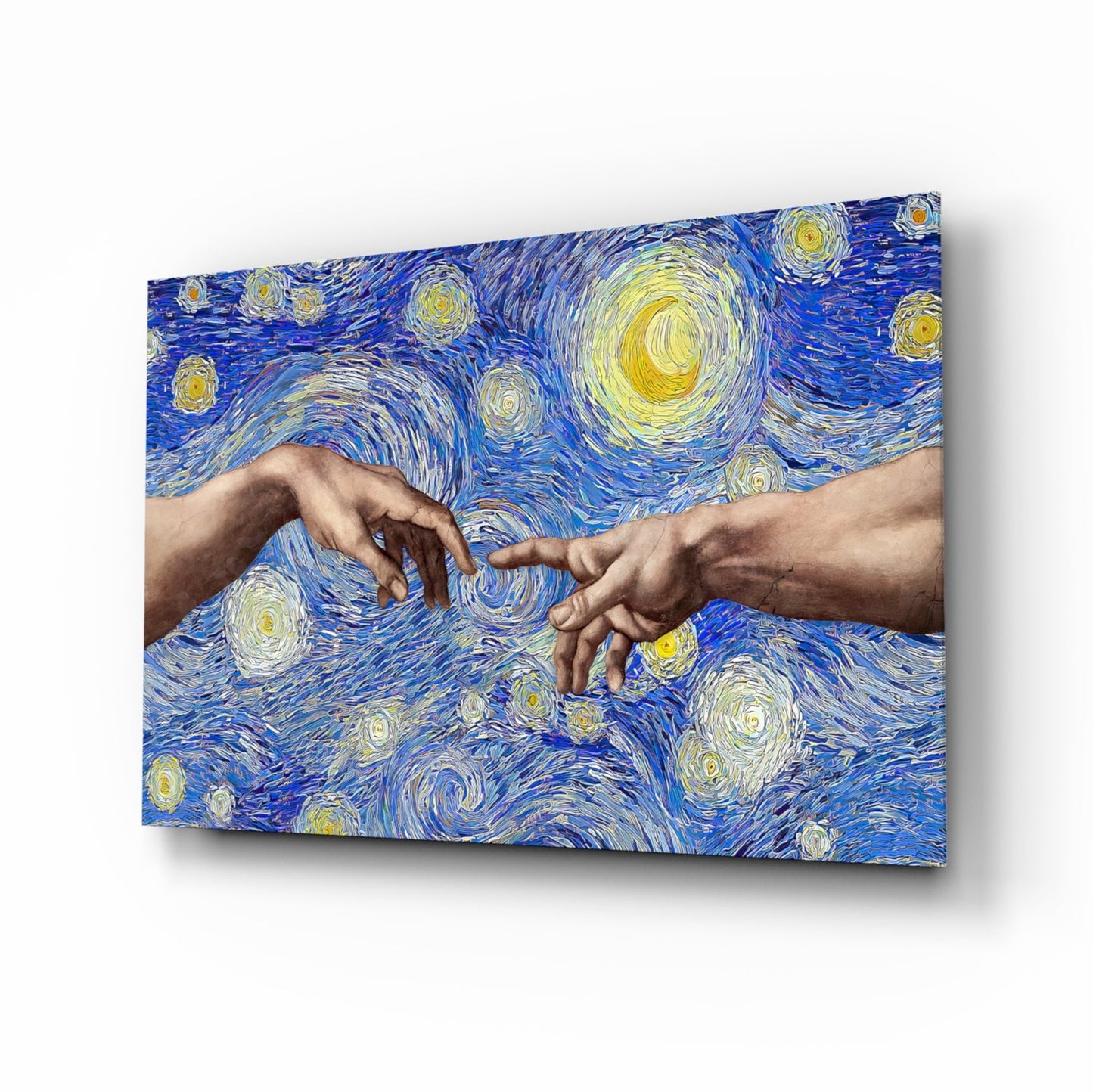 Glass wall art displaying two reaching hands against swirling blue and yellow Van Gogh-style starry background, angled three-quarter view.