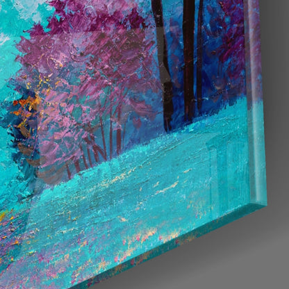 Close-up edge view of glass art showing layered turquoise, purple, and blue painted surfaces with gold accents.