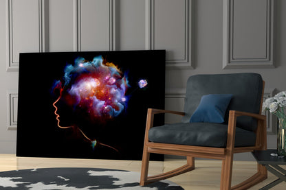 Glass wall art displaying neon orange head profile with colorful cosmic nebula brain imagery displayed in modern living room setting.