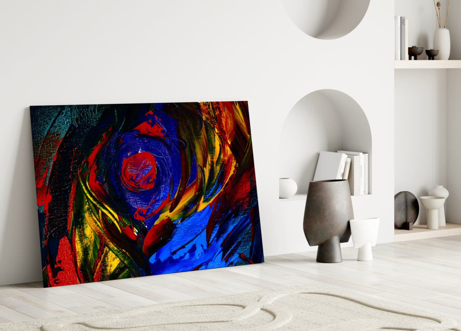 Vibrant abstract oil painting glass art featuring concentric circles in red, blue, yellow, and orange displayed in minimalist white interior setting.