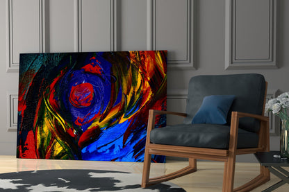 Vibrant abstract oil printing glass wall art displaying swirling red, blue, yellow, and green patterns displayed in a modern living room setting.