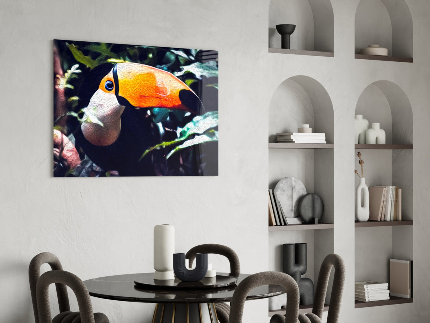 Colorful glass wall art depicting a toucan with orange and white plumage displayed above a round dining table in a modern interior.