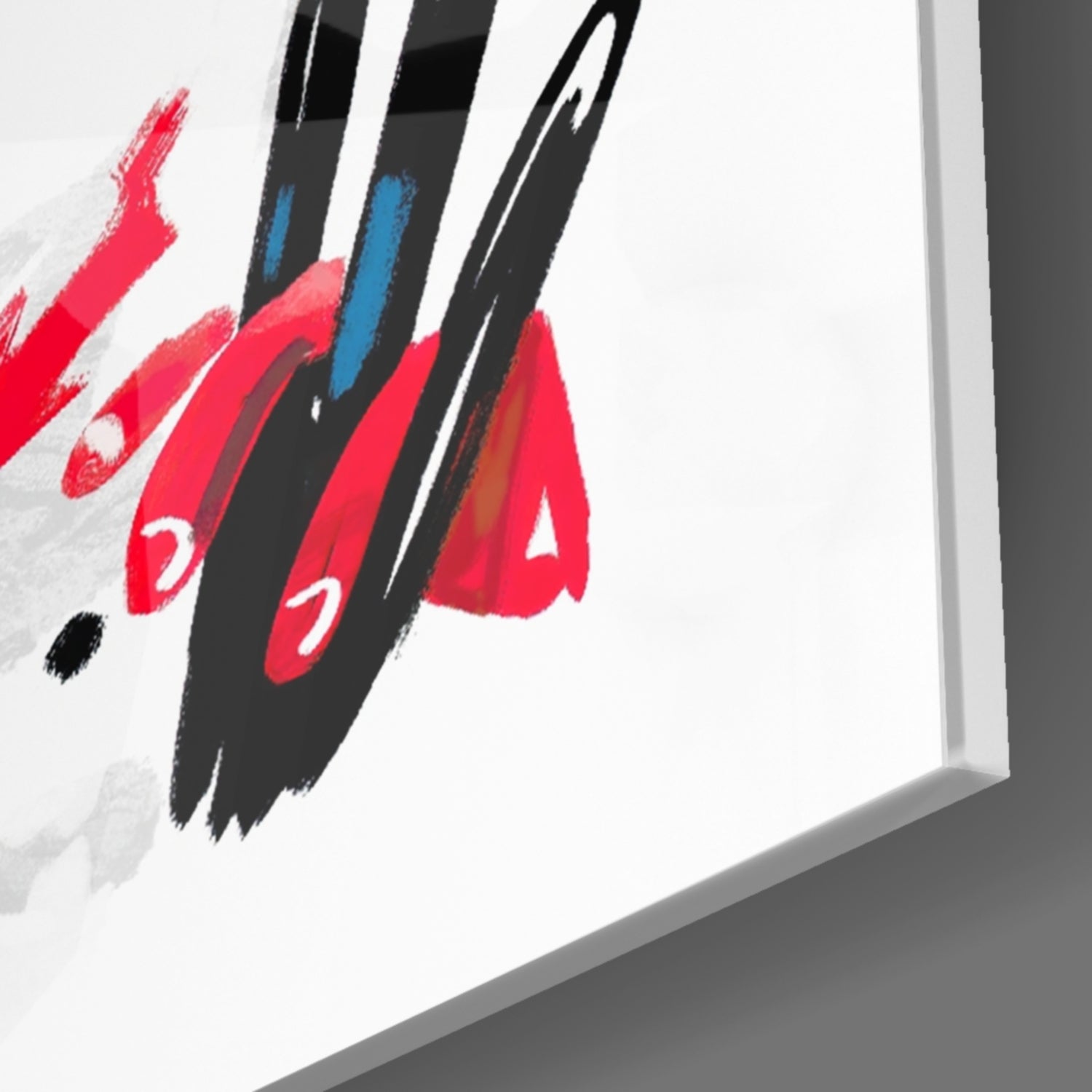 Close-up angled view of glass wall art with red, black, and blue brush strokes and numbers on white surface.