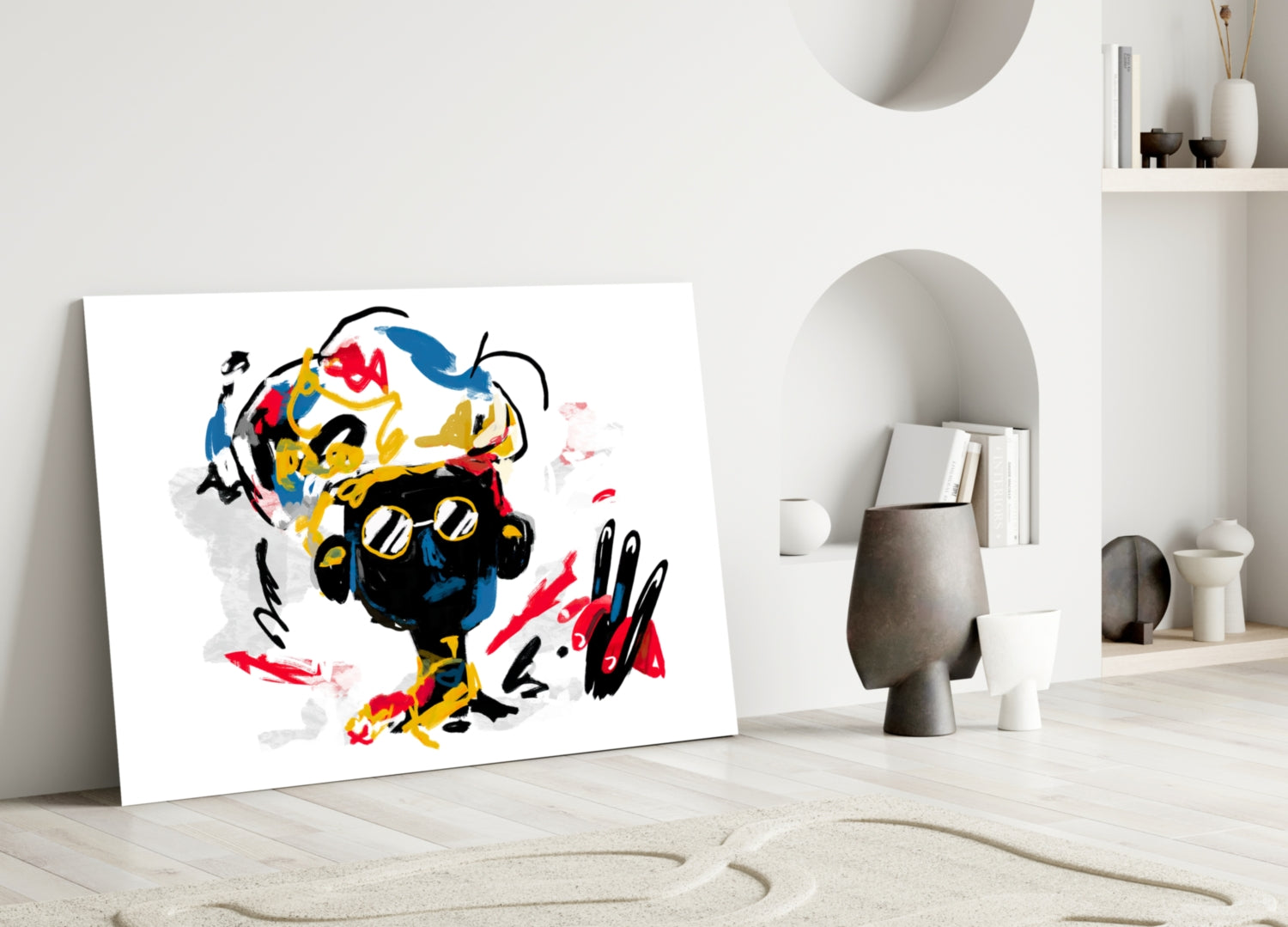Colorful abstract glass wall art leaning against white wall in minimalist interior, featuring black, yellow, red, and blue brushstrokes.
