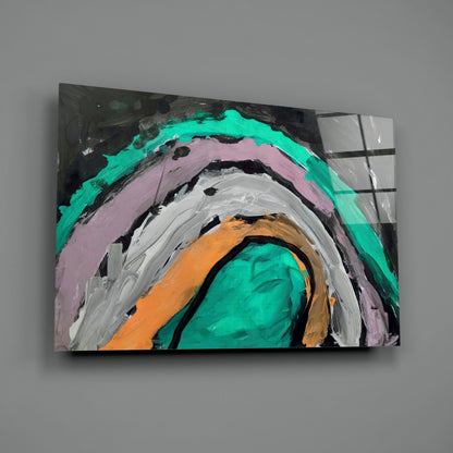 Abstract concentric curved stripes in turquoise, pink, gray, and orange paint on black glass panel.