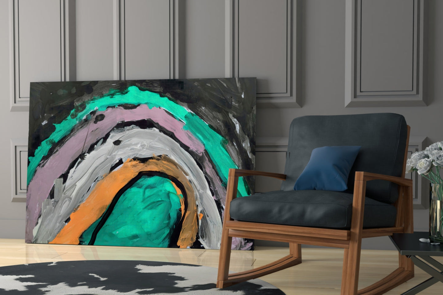 Abstract concentric arcs in turquoise, pink, white, orange, and black paint on dark glass panel displayed in modern interior setting.