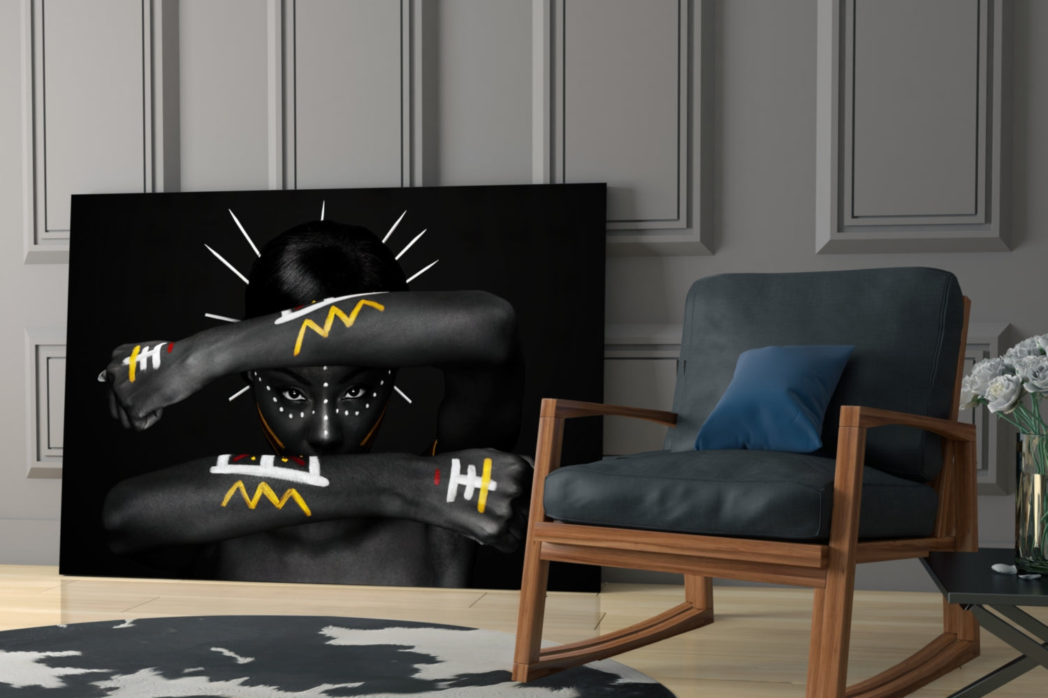 Black glass wall art depicting a figure with face paint and yellow-striped arms against a light interior setting.