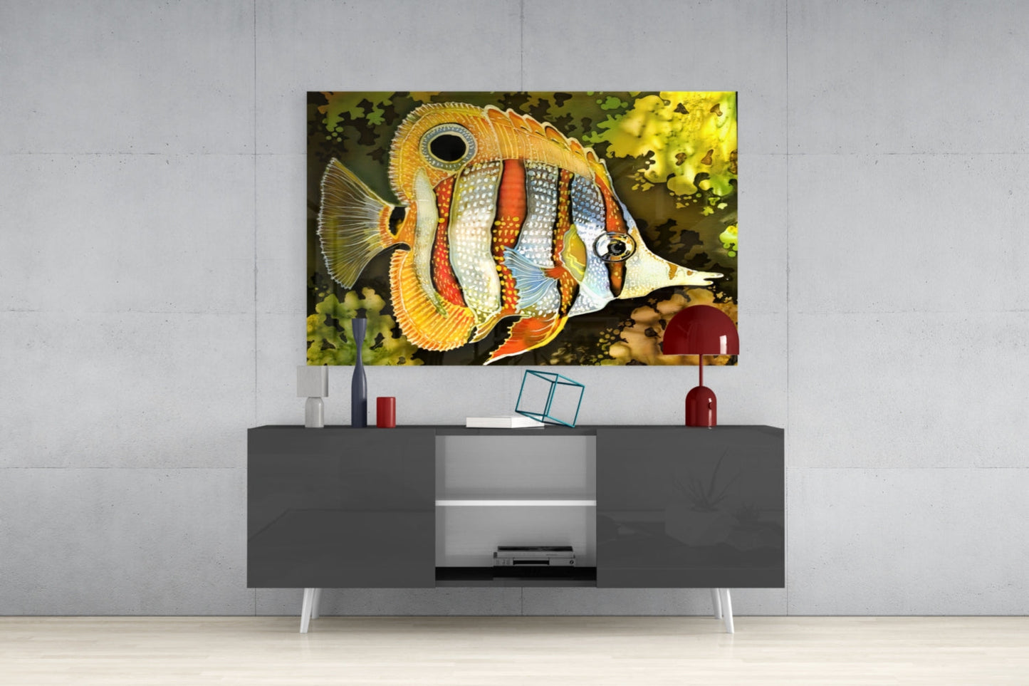 Colorful striped fish glass wall art displayed above gray media console in modern living room setting.