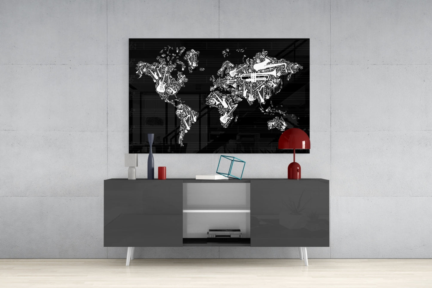 Black glass wall art featuring white line-drawn musical instruments forming a world map, mounted above gray media console with red lamp and decorative items.