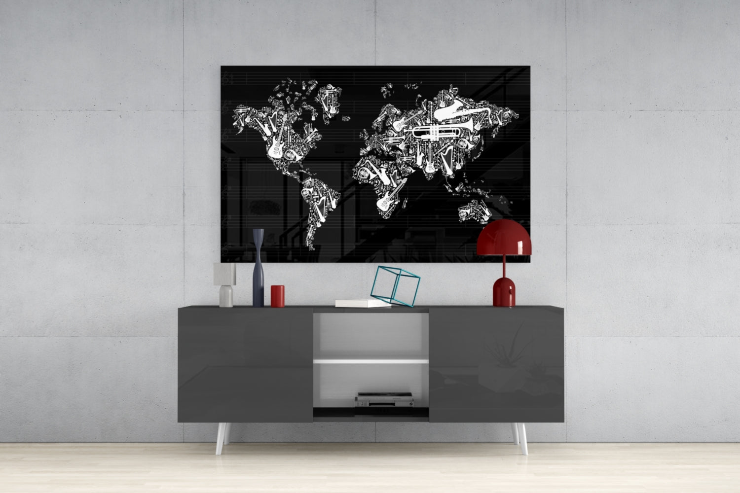 Black glass wall art featuring white line-drawn musical instruments forming a world map, mounted above gray media console with red lamp and decorative items.
