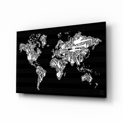 Black glass panel with white line art world map filled with musical instruments and symbols, angled perspective view.