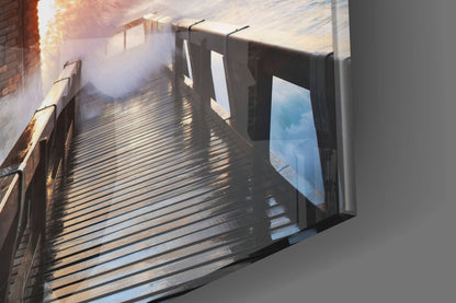 Fiery Sky Stormy Pier Lighthouse Glass Wall Art