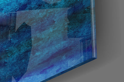 Angled perspective view of blue glass wall art with layered turquoise and deep blue tones showing textured surface detail.