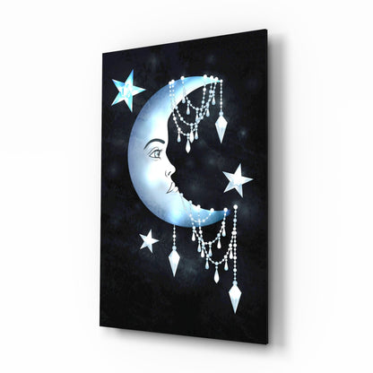 Angled perspective of glass wall art featuring a luminous crescent moon profile with dangling crystal chandelier elements and stars against a dark starry background.