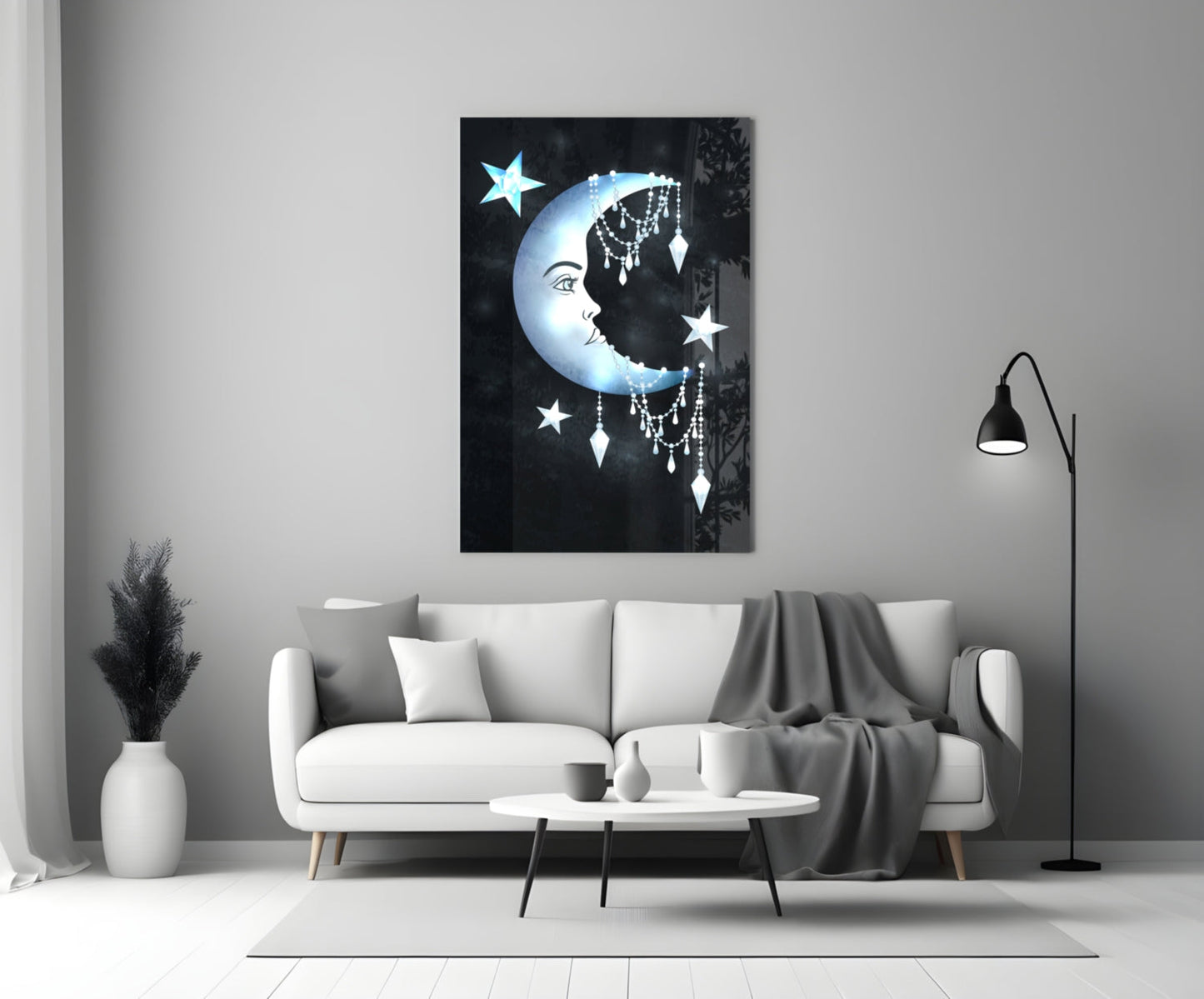 Moon Star Glass Wall Art displayed above a white sofa in a minimalist living room setting, showing celestial design with blue crescent moon and hanging crystals.
