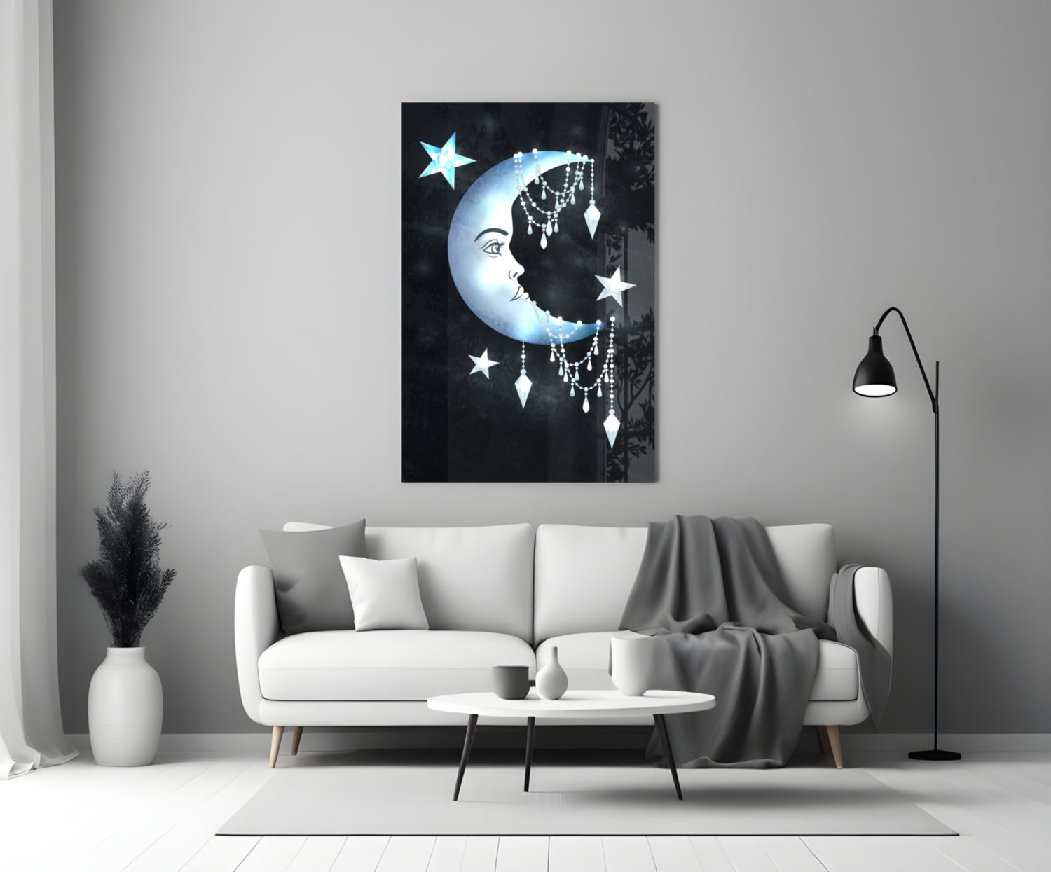 Moon Star Glass Wall Art displayed above a white sofa in a minimalist living room setting, showing celestial design with blue crescent moon and hanging crystals.