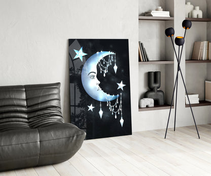 Moon Star Glass Wall Art displayed on floor against white wall in modern living room with gray sofa and shelving.