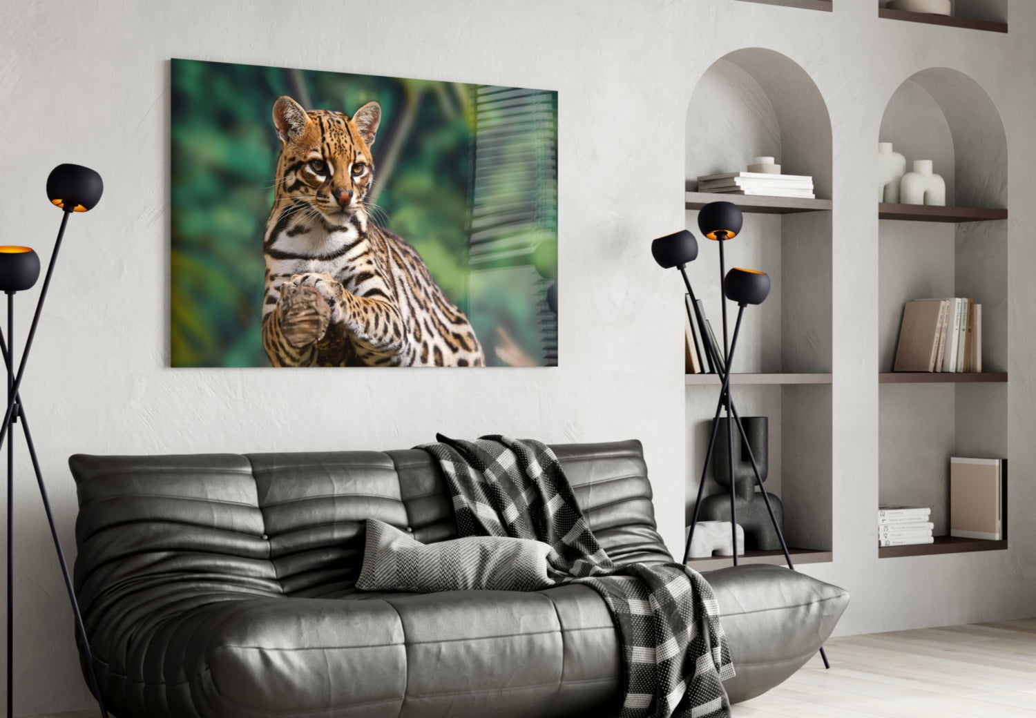 Cheetah glass wall art hung above a gray leather sofa in a modern living room with built-in shelving.