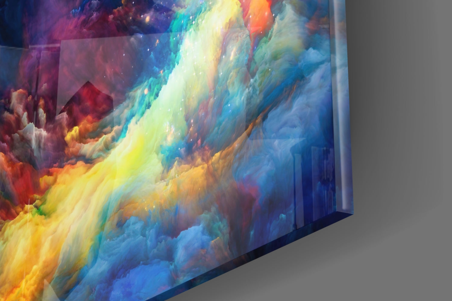 Angled side view of glass wall art displaying vibrant swirling colors—reds, yellows, blues, and purples—with clouds and celestial effects.