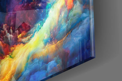 Angled side view of glass wall art displaying vibrant swirling colors—reds, yellows, blues, and purples—with clouds and celestial effects.