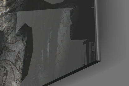 Close-up side view of frosted glass wall art displaying tattooed woman silhouette with decorative linework in black and grey tones.