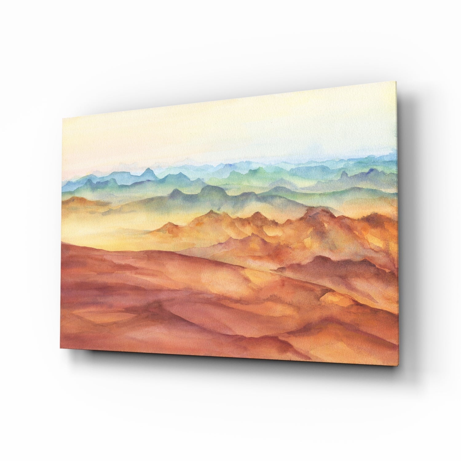 Layered mountain landscape in warm earth tones transitioning to cool blues, printed on glass panel displayed at angle.