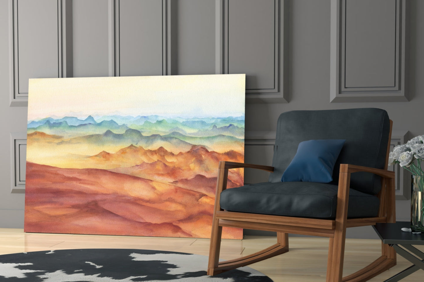 Abstract landscape glass art featuring layered mountains in warm orange, gold, and cool blue tones displayed in modern interior setting.