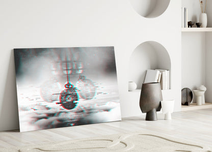 Pocket Clock Glass Wall Art leans against white wall in minimalist interior with sand-textured floor and decorative shelving, displaying glitched red and cyan pendant watch design.