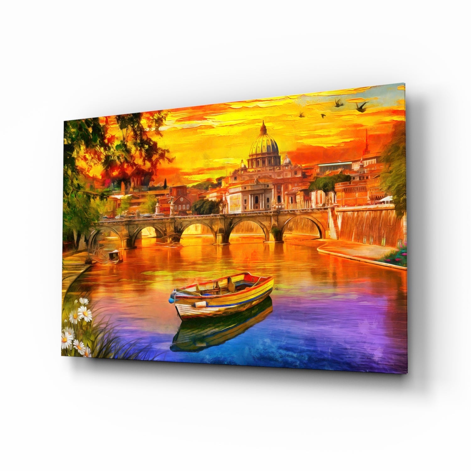 Angled view of glass wall art depicting St. Peter's Basilica at sunset with a boat on colorful water, mounted on white background.