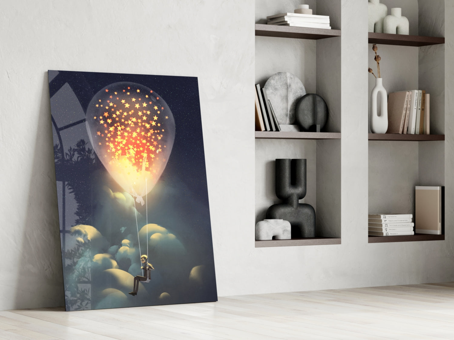 Starry Dream Glass Wall Art leaning against white wall beside shelving unit, showing glowing balloon illustration with gold stars on dark blue background.