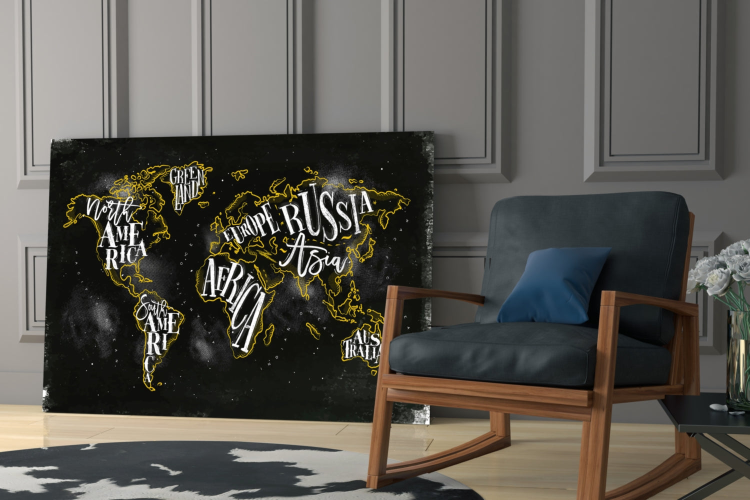Black canvas world map with gold outlines and white text labels displayed in modern living room next to wooden chair.