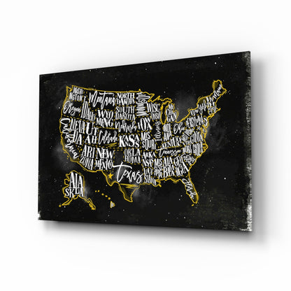 Black glass panel with gold-outlined USA map and state abbreviations in white handwritten text on starry background, angled three-quarter view.