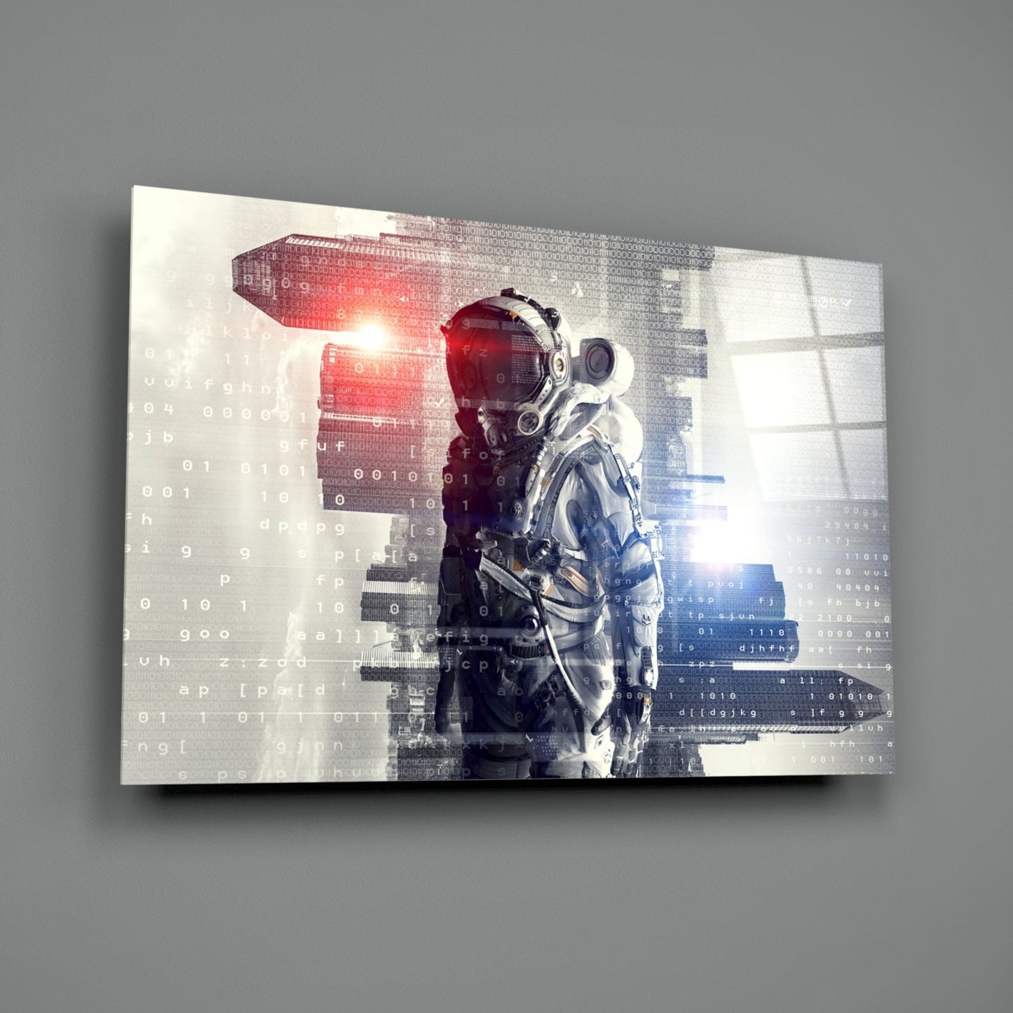 Angled view of glass wall art depicting a white astronaut with red and blue digital code overlay against a light background.