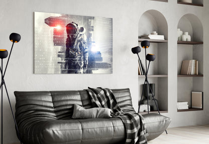 Digital Astronaut Glass Wall Art hung above black leather sofa in modern living room with white arched shelving.
