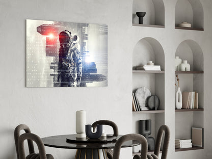 Digital astronaut glass art hung above round black table in modern dining room with built-in shelving.