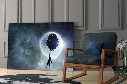 Man Floating on Balloons Full Moon Glass Wall Art