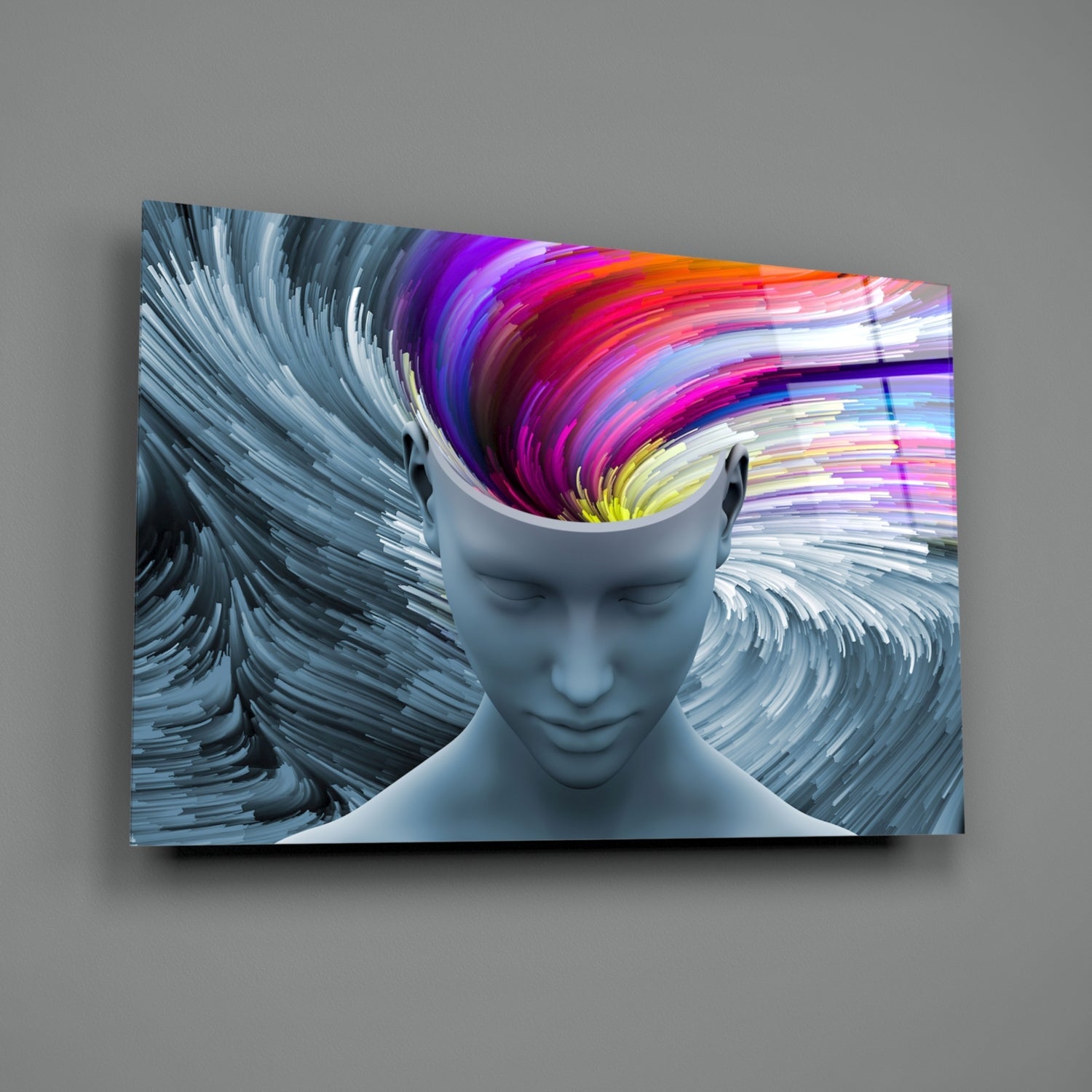 Abstract glass wall art featuring a gray sculptured head with colorful rainbow brushstrokes emerging from the crown against swirling gray background.
