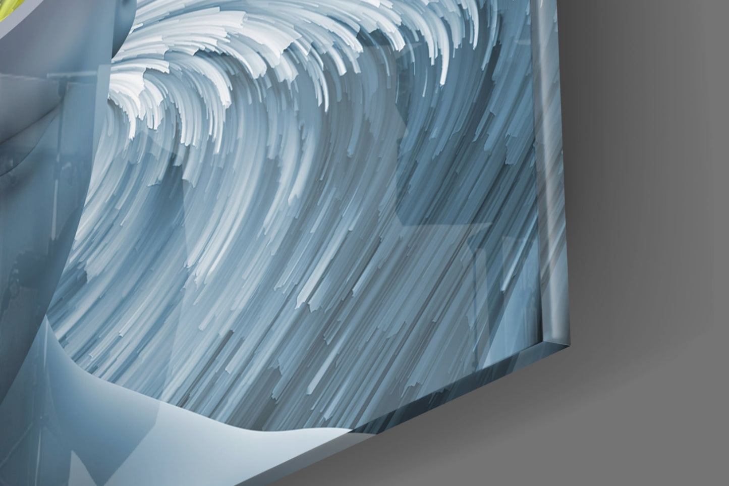 Close-up overhead view of gray glass wall art with white and blue brushstroke pattern creating curved wave design.