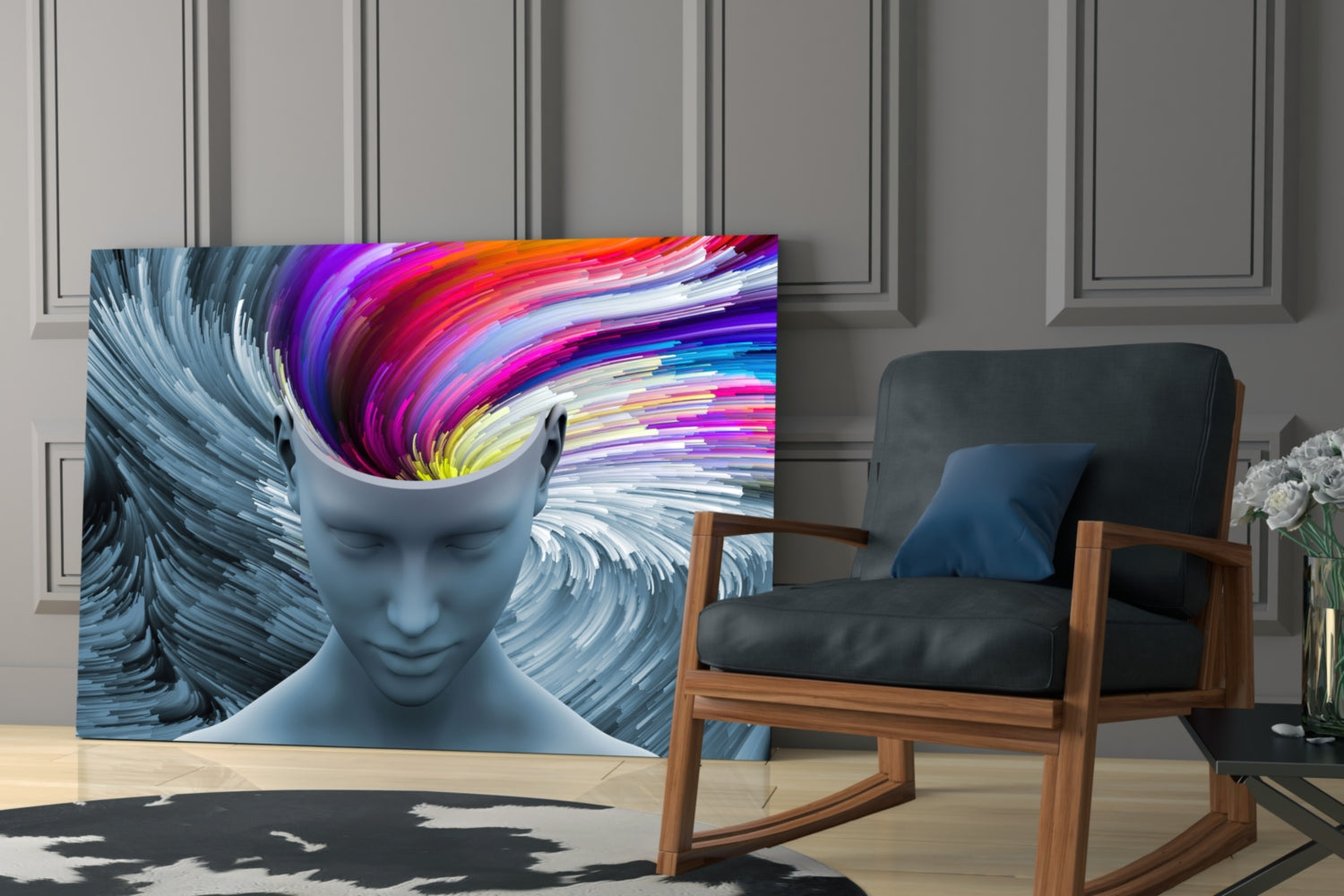 Gray glass wall art featuring a stylized face with colorful rainbow swirls emanating from the head, displayed in a modern living room.