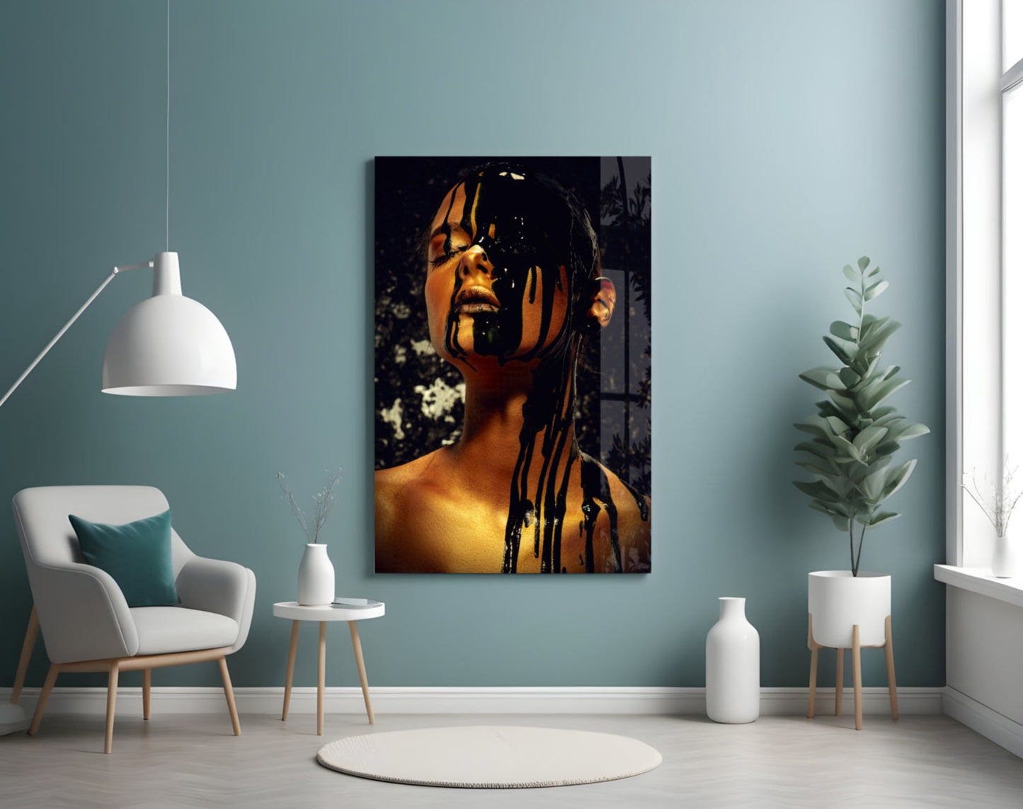 Portrait stained glass wall art depicting a woman's face with gold and black dripping paint effect, displayed in modern teal room interior.