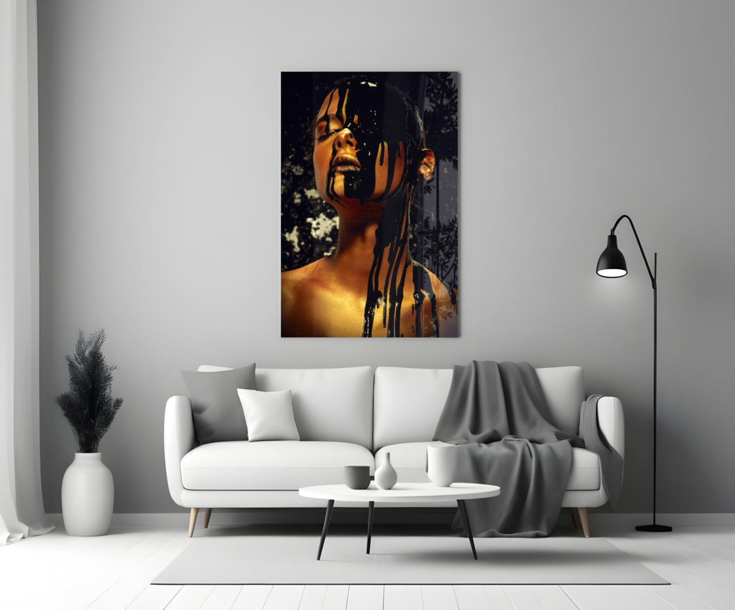 Portrait stained glass wall art depicting a woman's face in golden and black tones, displayed above a white sofa in a modern living room.